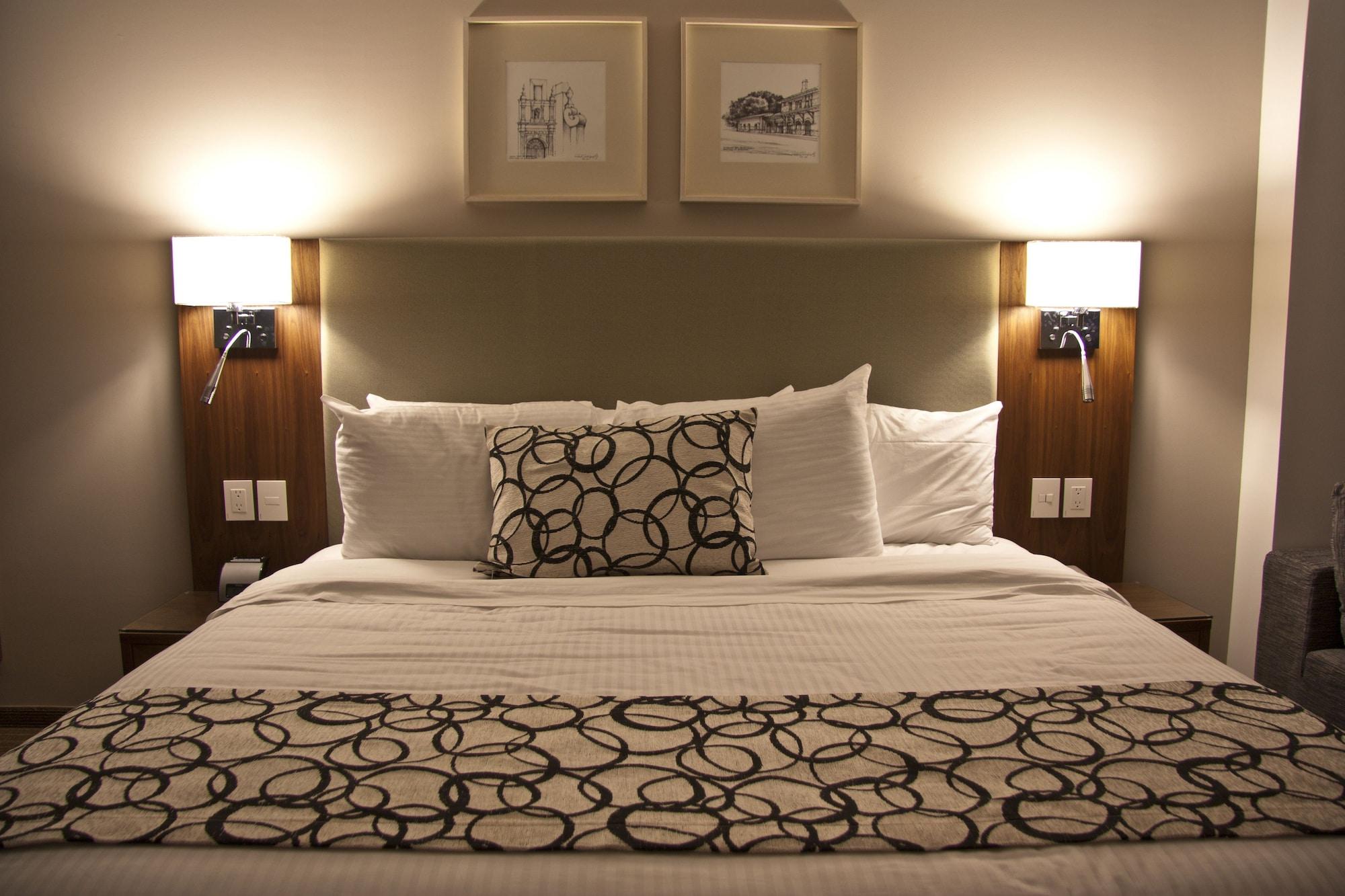 Casa Inn Premium Hotel Queretaro Miranda Ngoại thất bức ảnh A bed